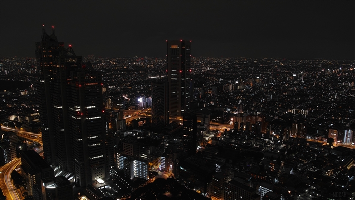 Night city skyline with skyscrapers in Tokyo 4K