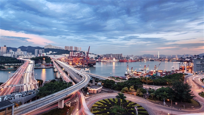 Cityscape with bridges and harbor at dusk 4K