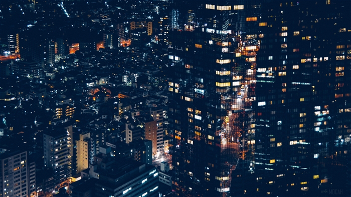 Night city skyline in Minato, Japan with illuminated buildings
