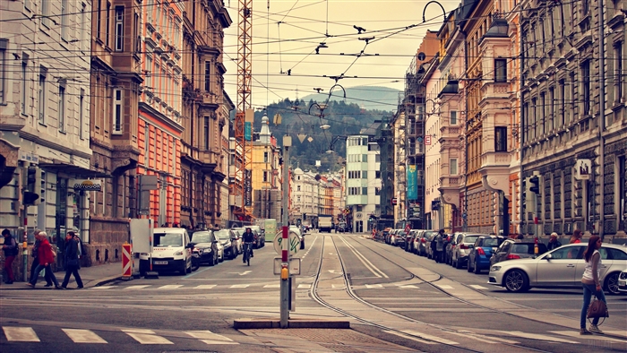 Innsbruck, Austria street with tram tracks and buildings 4K