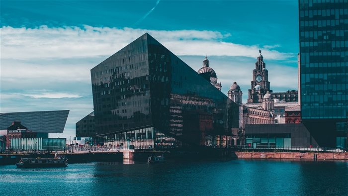 Modern architecture and historic buildings by the water