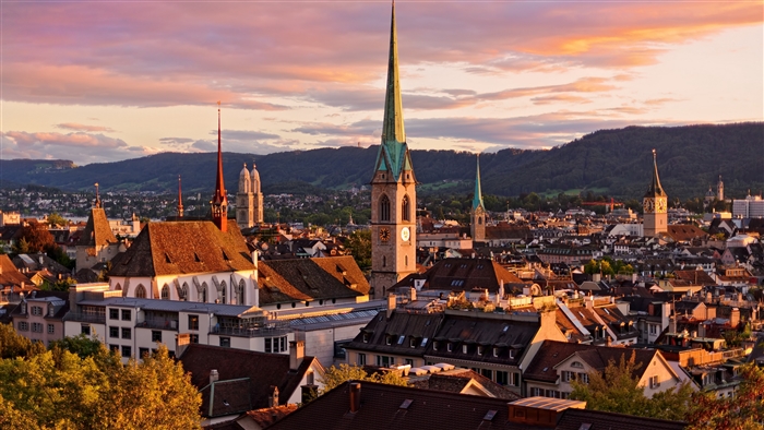 Zurich skyline with church spires at sunset