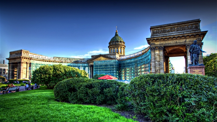Kazan Cathedral in St. Petersburg with a statue and garden