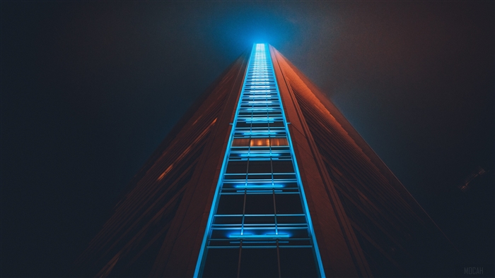 Skyscraper with blue lights at night 4K