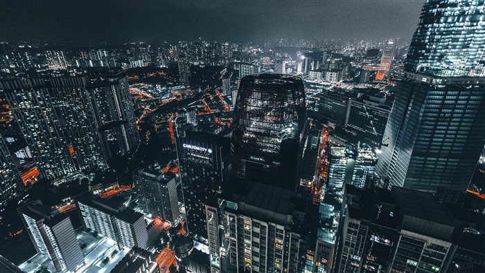 Night cityscape with skyscrapers and city lights 4K