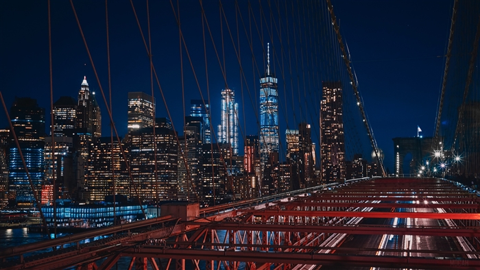 New York City skyline and Brooklyn Bridge at night 4K