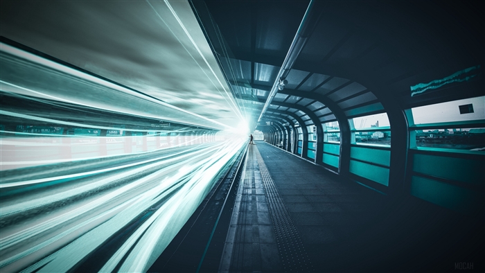Man on train platform with light streaks 4K
