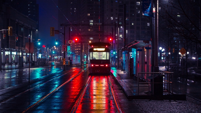 Trolley at a city stop in the evening 4K