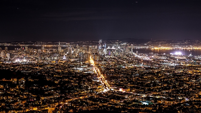 San Francisco cityscape at night with Bay Bridge