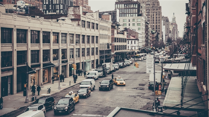 City street with buildings and cars 4K
