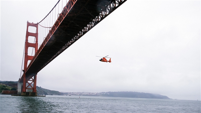 Rescue Helicopter Flying Under Golden Gate Bridge