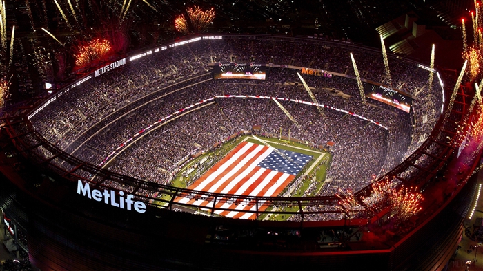 MetLife Stadium with American Flag and Fireworks