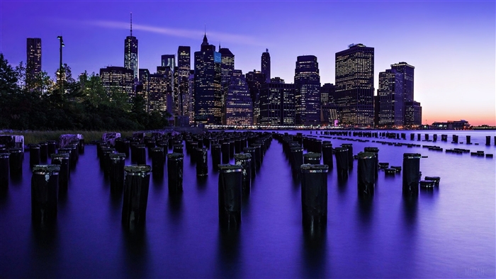 New York City Skyline at Dusk with Pier Pilings