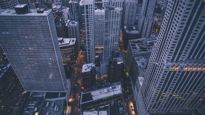 Aerial view of city skyscrapers at dusk