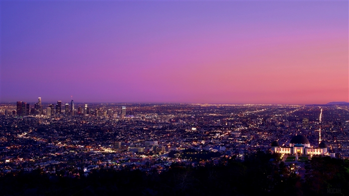 Los Angeles cityscape at dusk with Griffith Observatory