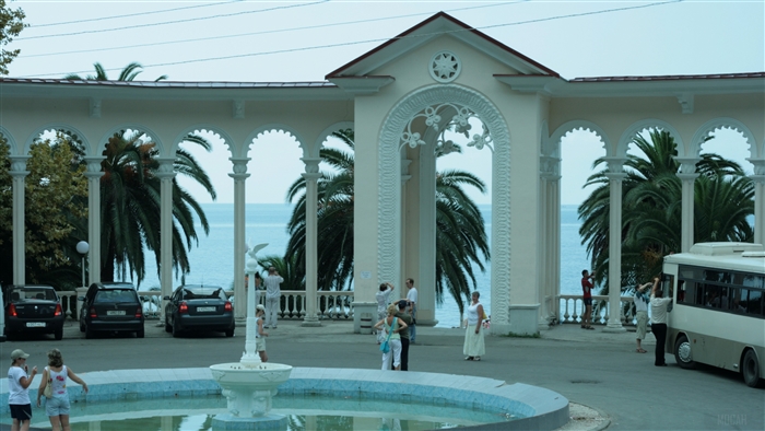 Promenade with arches and palm trees in Gagra, Abkhazia