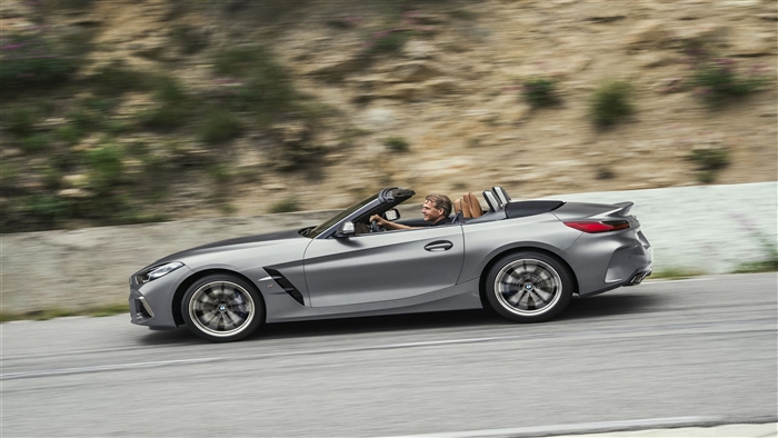 2019 BMW Z4 sDrive20i convertible driving on a road