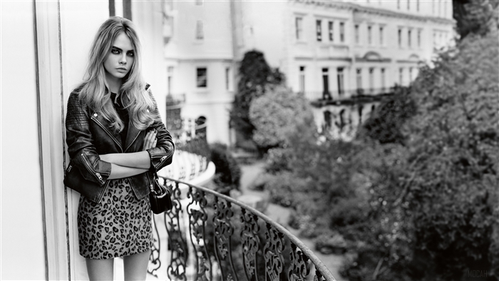 Cara Delevingne on a Balcony