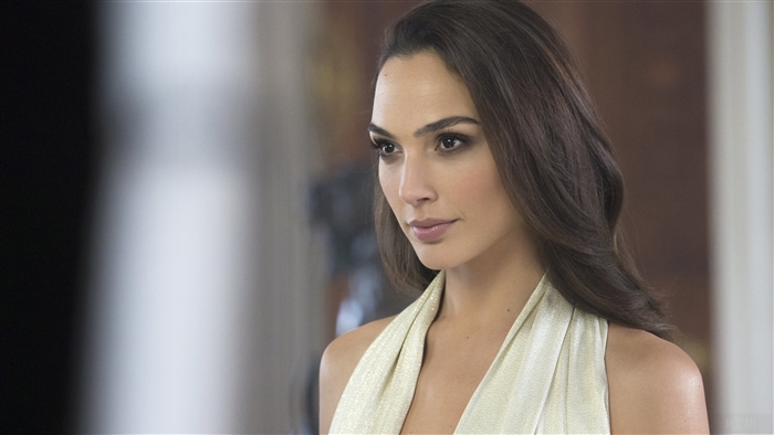 Gal Gadot in a gold dress