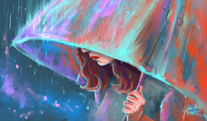 Girl under an umbrella in the rain