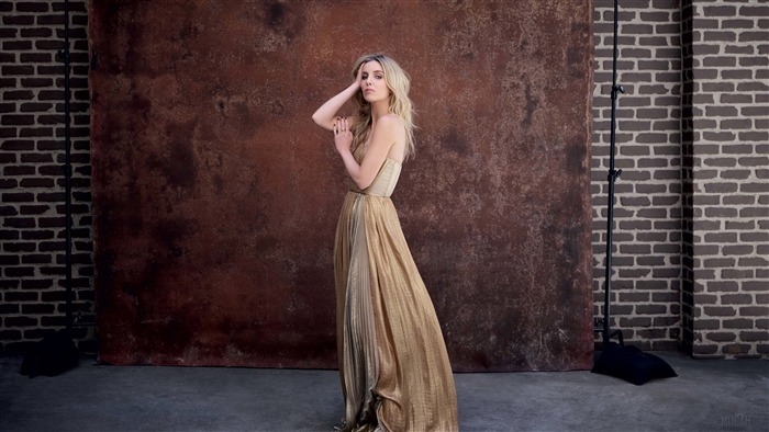 Annabelle Wallis in a golden dress
