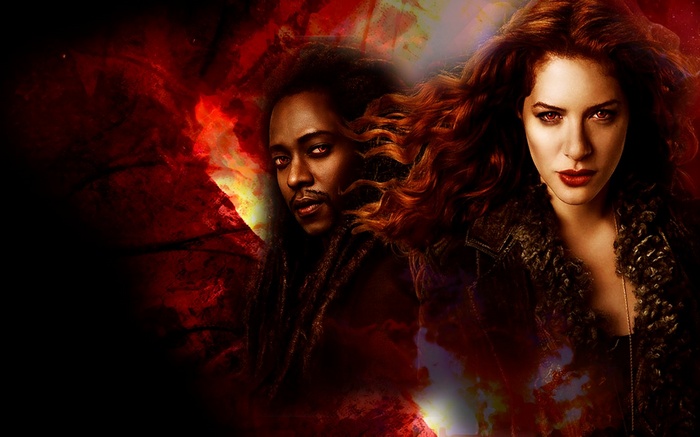 Two vampires with red eyes and flowing hair