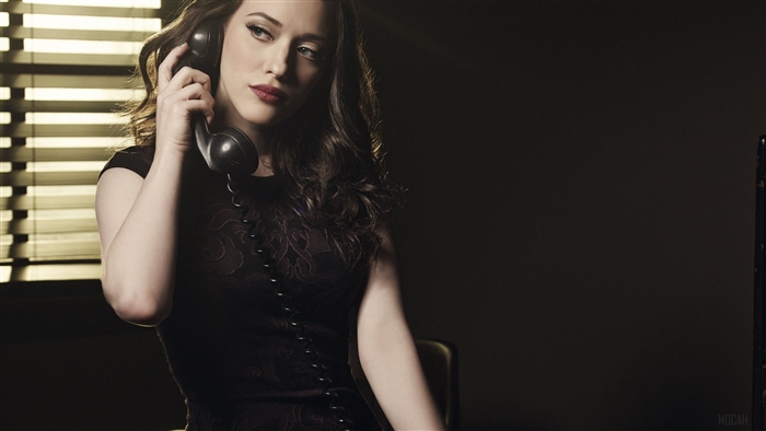 Kat Dennings on a vintage phone