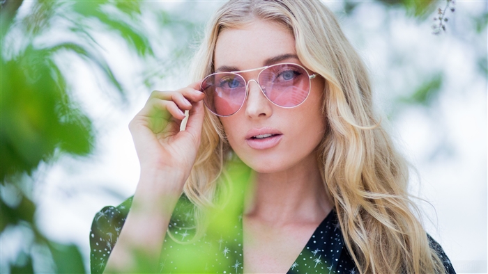 Elsa Hosk wearing pink sunglasses