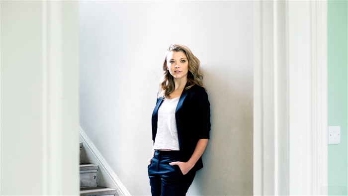 Natalie Dormer in a black suit