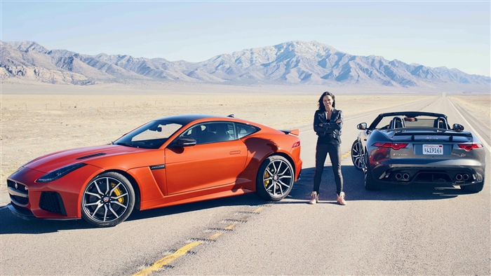 Michelle Rodriguez with Jaguar sports cars