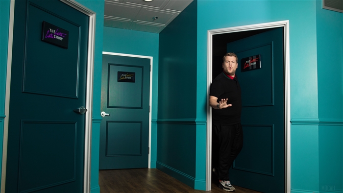 James Corden from The Late Show in a hallway