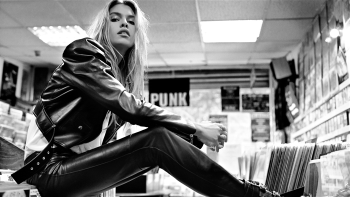 Stella Maxwell in leather jacket and pants