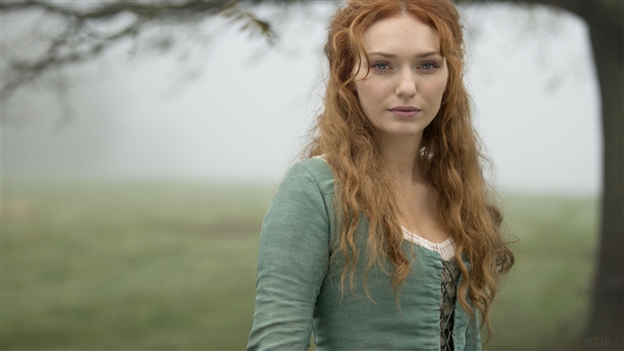 Eleanor Tomlinson in a green dress