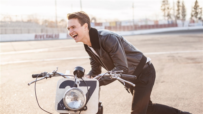 Ansel Elgort on a motorcycle