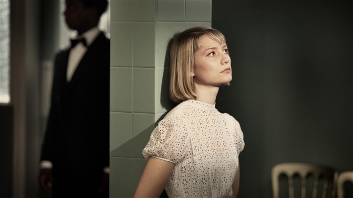 Mia Wasikowska in a white dress