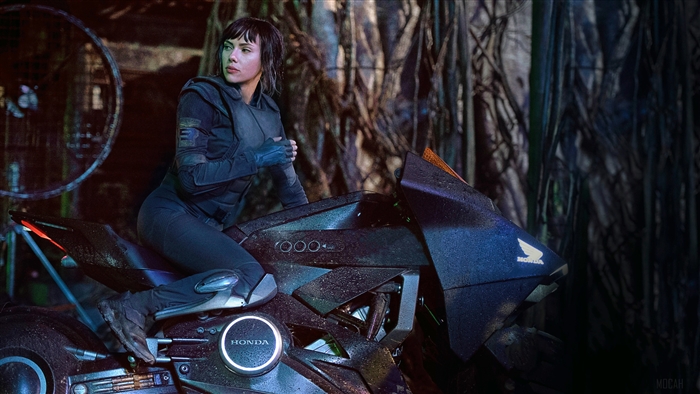 Major Mira Killian from Ghost in the Shell on a Honda motorcycle