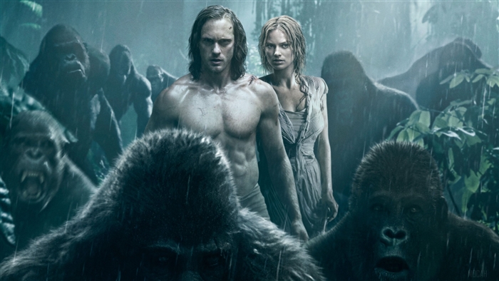 Tarzan and Jane surrounded by gorillas in the jungle