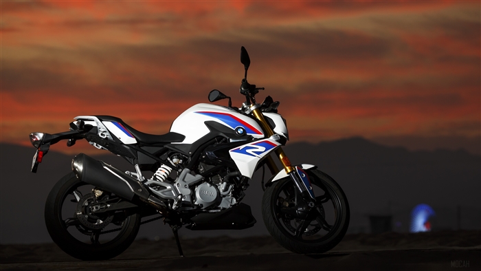 BMW G310 R motorcycle at sunset