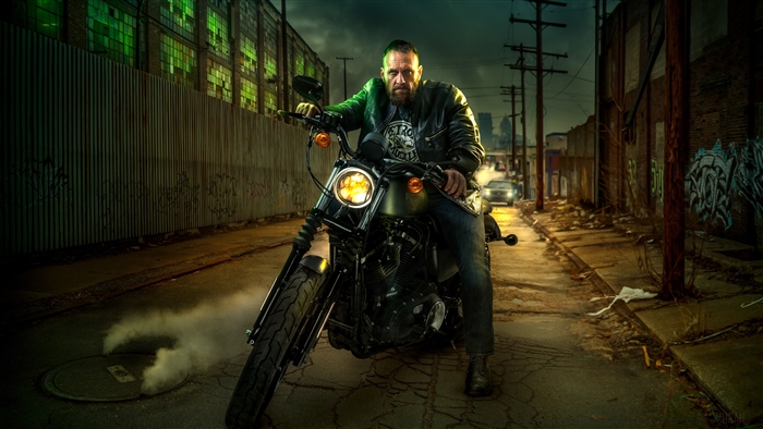 Man on Harley Davidson motorcycle in alley 4K