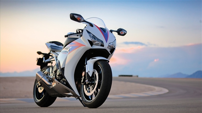 White Honda CBR 1000RR motorcycle at sunset