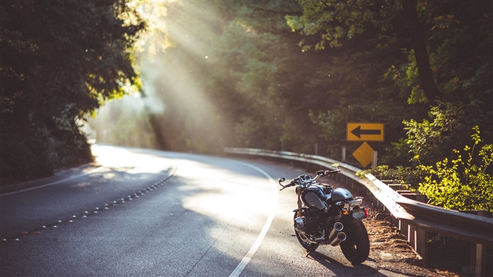 BMW R nineT motorcycle on a winding road