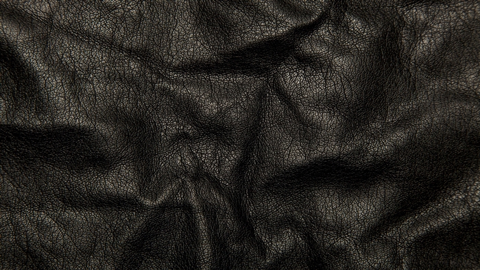 Black leather texture with wrinkles and cracks 4K