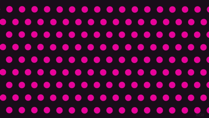 Pink polka dots on a dark background