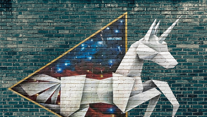 Origami unicorn graffiti on brick wall 4K