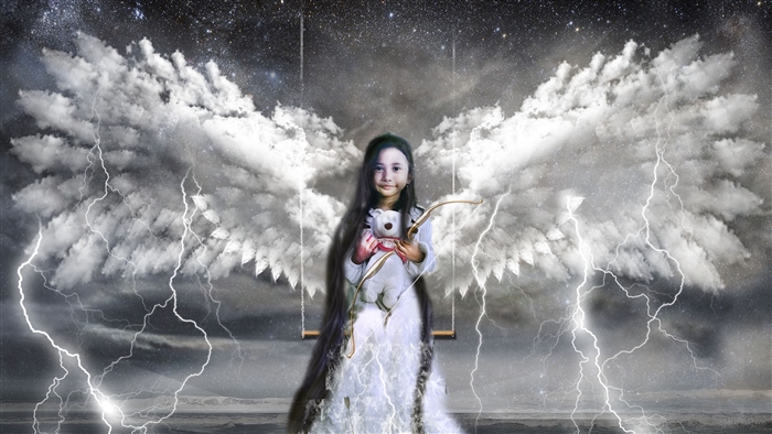 Surreal child angel with toy and bow on swing