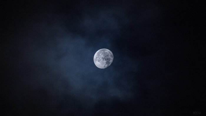 Moon in the night sky with clouds 4K