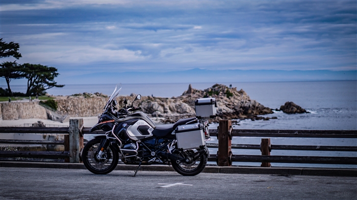 BMW motorcycle parked by the sea