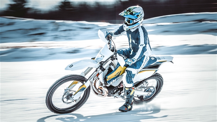 Motorcyclist riding on snow in 4K