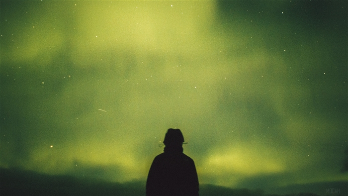 Silhouette under a starry night sky 4K