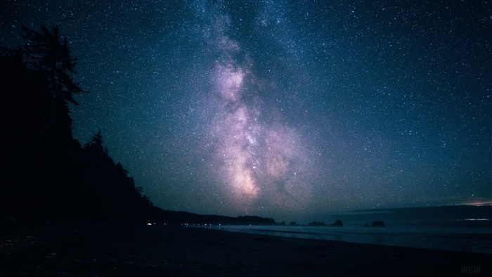 Milky Way over a beach at night 4K